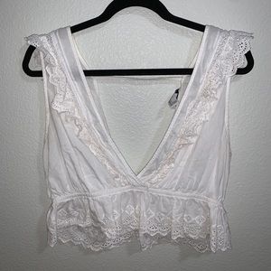 white frilly top